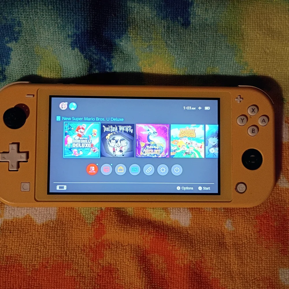 Portable Yellow Gaming Console